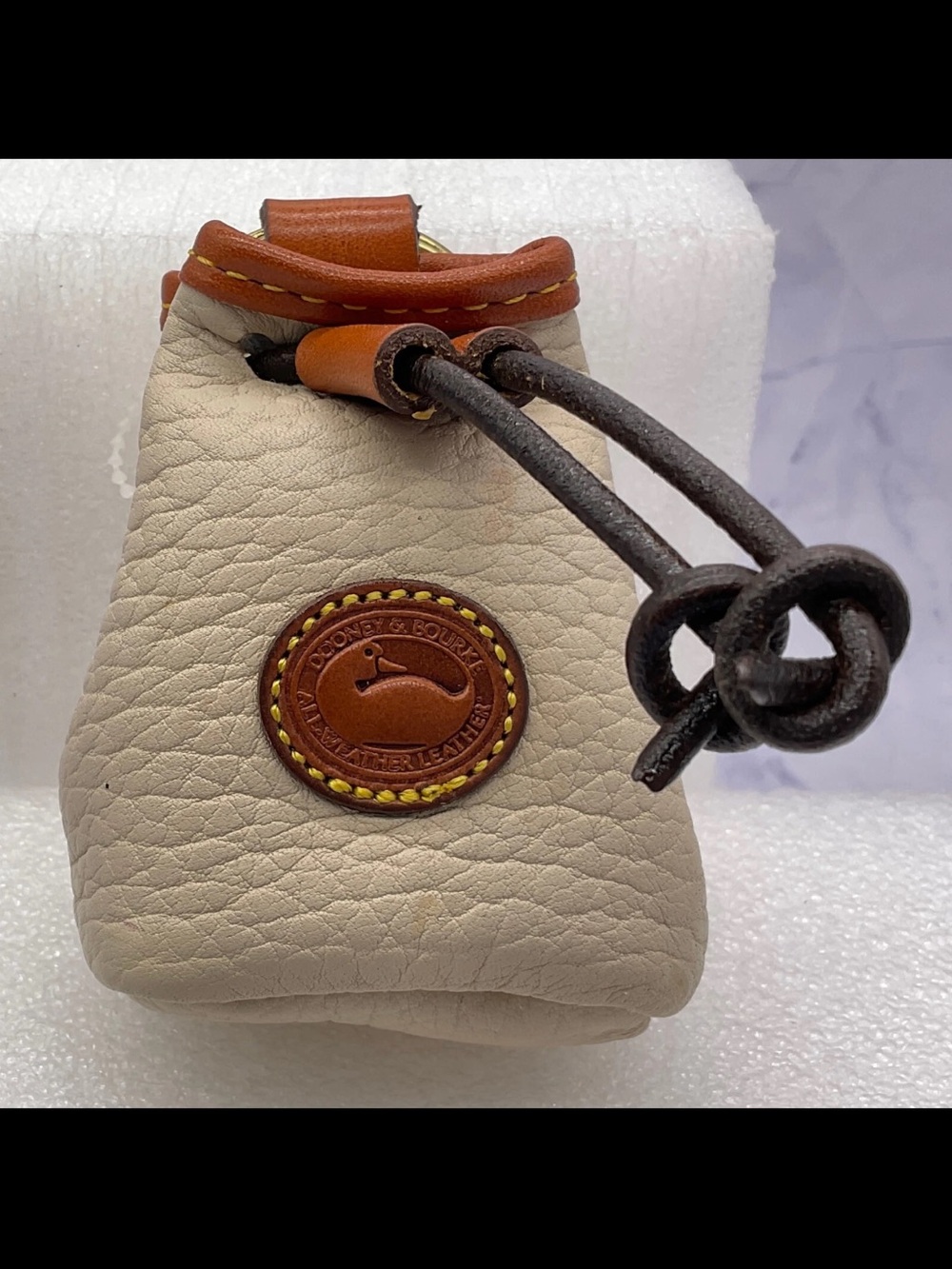 Dooney & Bourke Beige Pebble Leather Drawstring Pouch KEYCHAIN NWT